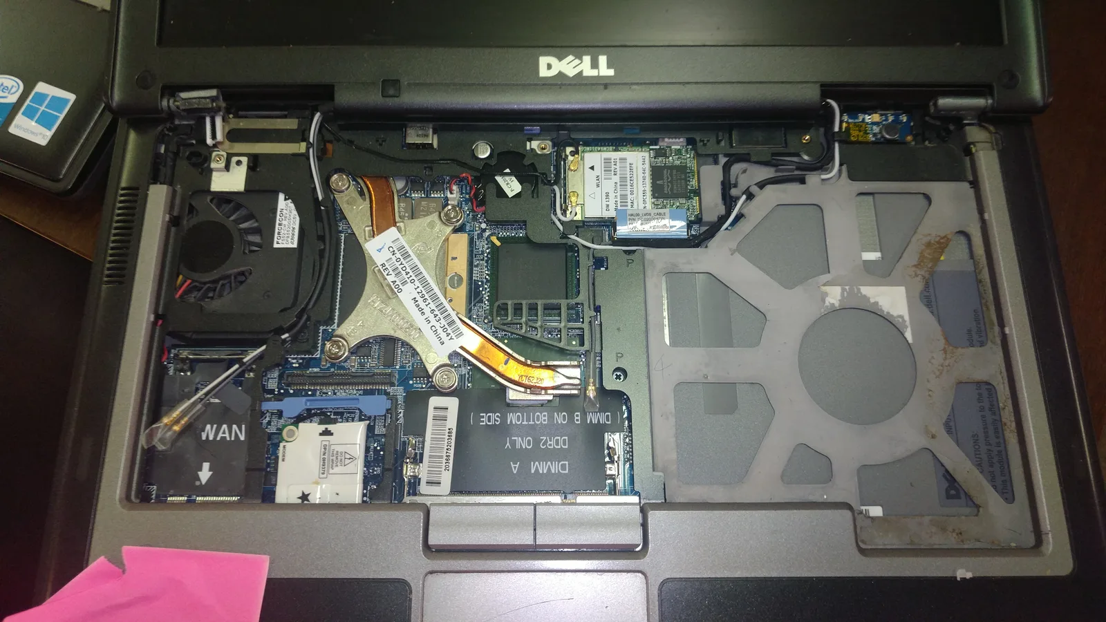 Dell laptop opened for hardware repair at SUZU PC and Web in Atlanta, GA