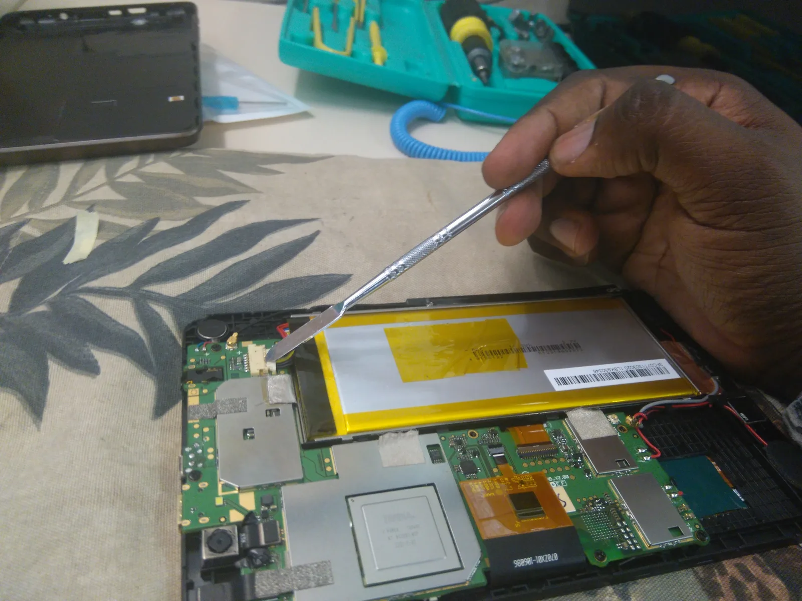 Laptop battery and motherboard repair at SUZU PC and Web in Atlanta, GA