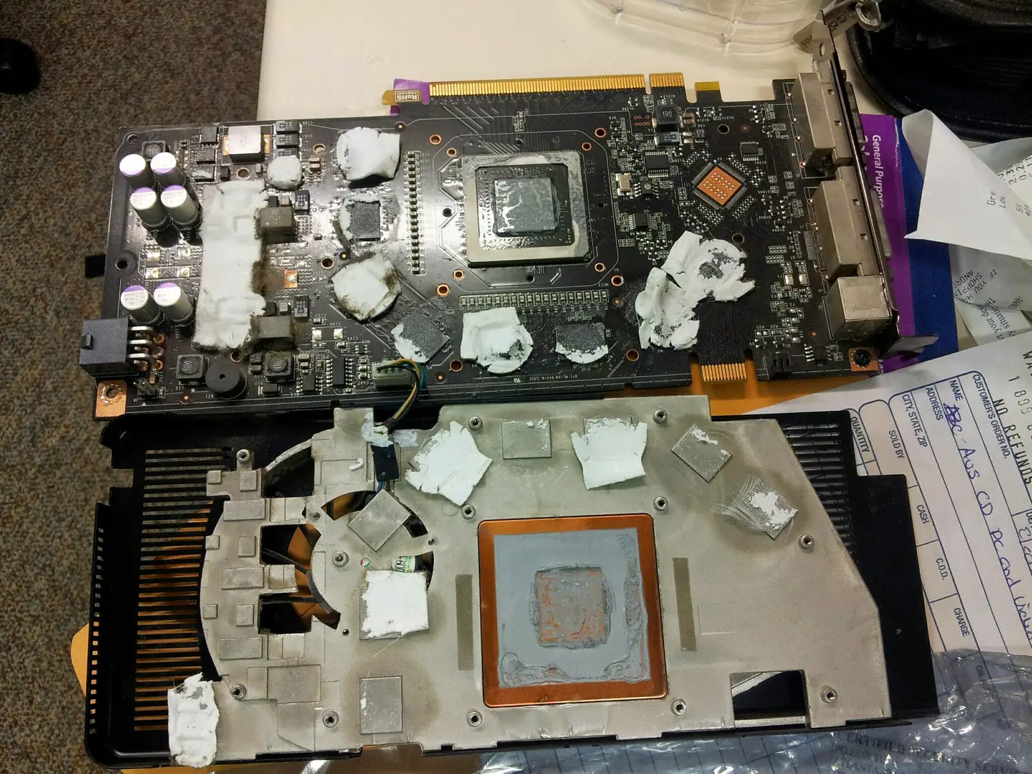 Laptop disassembled for motherboard repair at SUZU PC and Web in Atlanta, GA