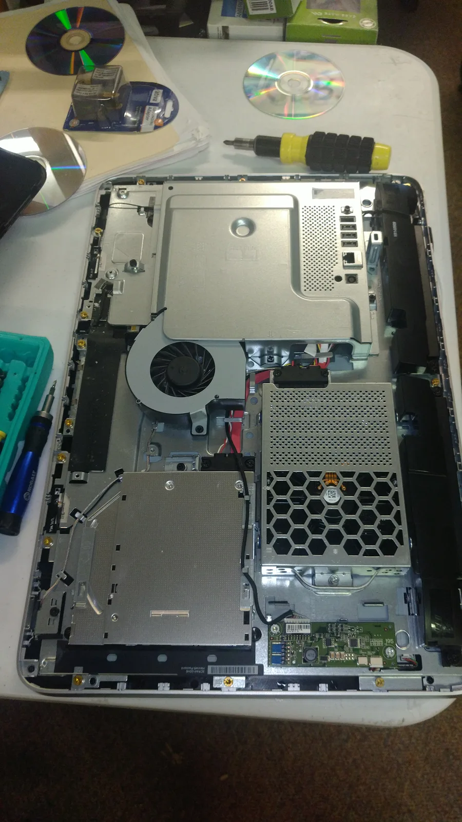 HP laptop opened for internal hardware repair at SUZU PC and Web in Atlanta, GA